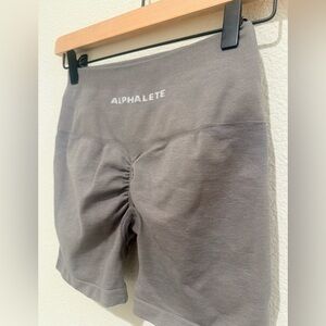 Alphalete Amplify Shorts in brown gray high waistband back ruched detailing